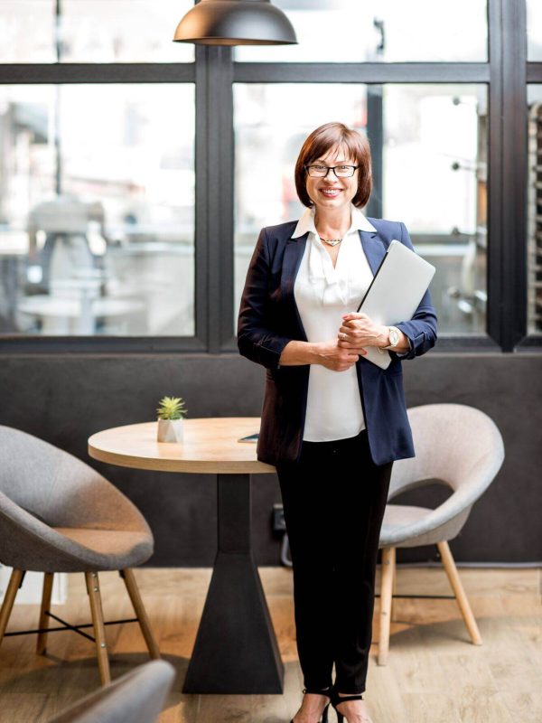 senior-business-woman-portrait-indoors-2025-03-13-03-54-37-utc.jpg